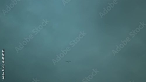 Mysterious object flying under an overcast sky, hinting at unidentified phenomena