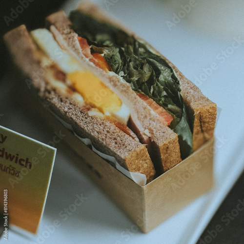Sandwich vegetables and salad in the box