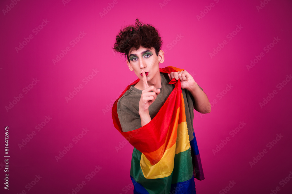 A funny guy in make-up is doing fitness. retro style. Pink background. A funny guy in make-up is doing fitness. retro style. Pink background.