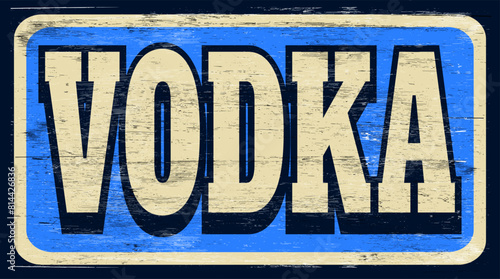 Aged retro vodka sign on wood