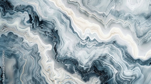 A pattern mimicking the swirls and veins of marble in soft grays and whites. photo
