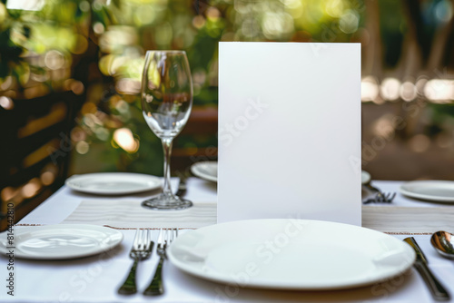 Outdoor dining setup with empty white menu on a rustic wooden table, elegant tableware and nature background. For restaurant and alfresco dining concept with copy space. Ai generation