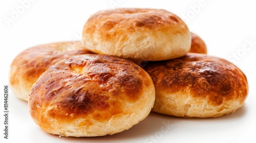 Close-up shot of potato buns, showcasing their fluffy, tender texture and subtle potato flavor, perfect for burger ads, isolated background © Paul