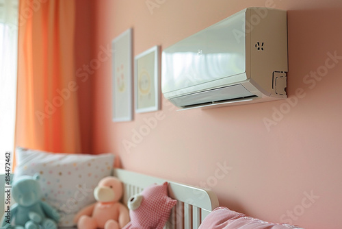 A modern, energy-efficient air conditioner mounted on a pastel-colored wall in a cozy baby bedroom, ensuring optimal climate control for a comfortable and safe kids room environment   photo