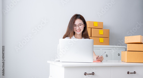 Young asian girl is freelancer with her private business at home office