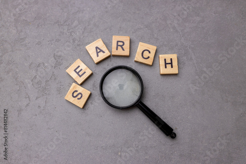 Magnifying glass with the word 'info'. Information search concept