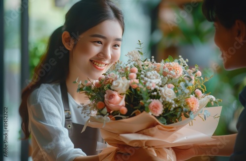 Woman Holding Bouquet of Flowers Next to Man