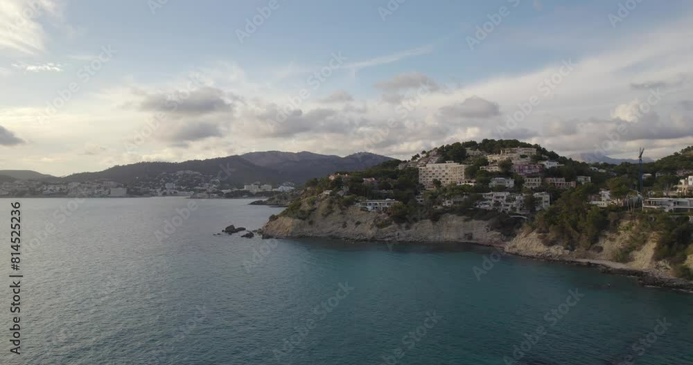 Scenic Sunset View Of Hotels On Coast Of Mallorca Near Santa Ponsa In Spain. drone shot Scenic Sunset View Of Hotels On Coast Of Mallorca Near Santa Ponsa In Spain. drone shot