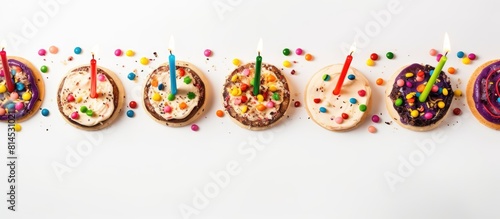 A birthday celebration for children with a white background featuring pizza slices and colorful candles on a cake The top view image offers copy space for text