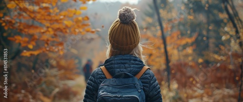Person Walking Through Forest With Backpack