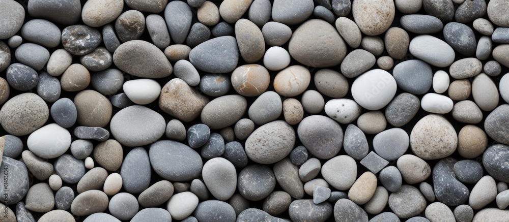 Smooth small pebbles give the stone grey masonry a textured appearance in this copy space image Smooth small pebbles give the stone grey masonry a textured appearance in this copy space image