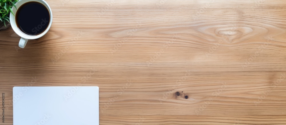 A copy space image featuring a panoramic photograph of a pen and smartphone on a wooden surface with a blank screen and resume templates A copy space image featuring a panoramic photograph of a pen and smartphone on a wooden surface with a blank screen and resume templates