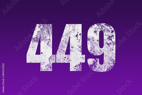 flat white grunge number of 449 on purple background. photo