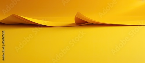 There is a yellow paper as the background for the copy space image