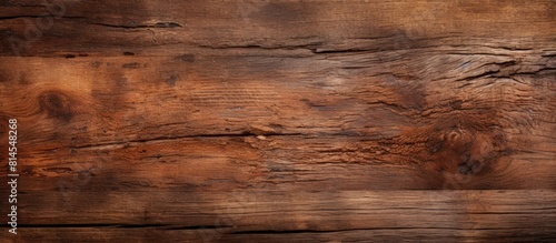 An aged untreated wood texture with the appearance of weathered and worn out wood. with copy space image. Place for adding text or design