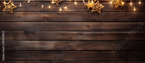Festive Christmas decorations arranged on a rustic wooden background creating a beautiful copy space image