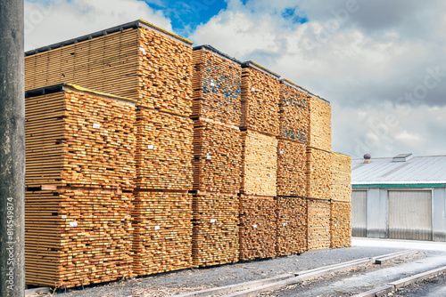 Outdoor timber warehouse with wood plank stacks ready for shipping in Australia © myphotobank.com.au