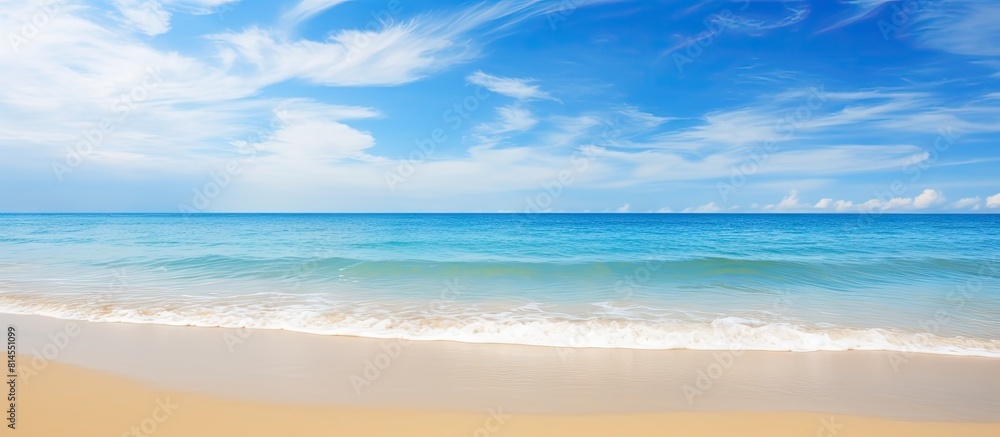 Copy space image of a stunning tropical seascape featuring a breathtaking sea beach with a vibrant blue sky golden sand and a shining sun depicting the beauty of a summer day at the beach