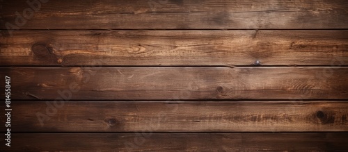 A copy space image featuring a textured wooden background