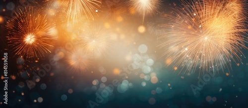 An abstract holiday background with fireworks at New Year featuring ample copy space