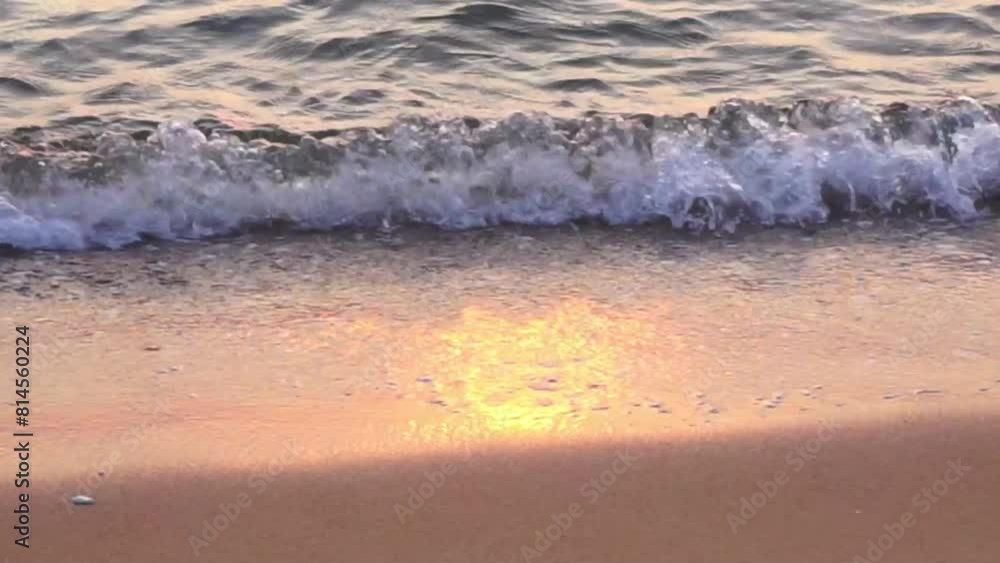 Sea surf with sunset reflection at beach, Pattaya beach Sea surf with sunset reflection at beach, Pattaya beach