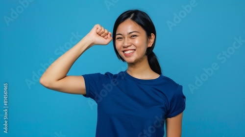 Happy young asian woman smiling and looking at camera. Strong body and healthy.
