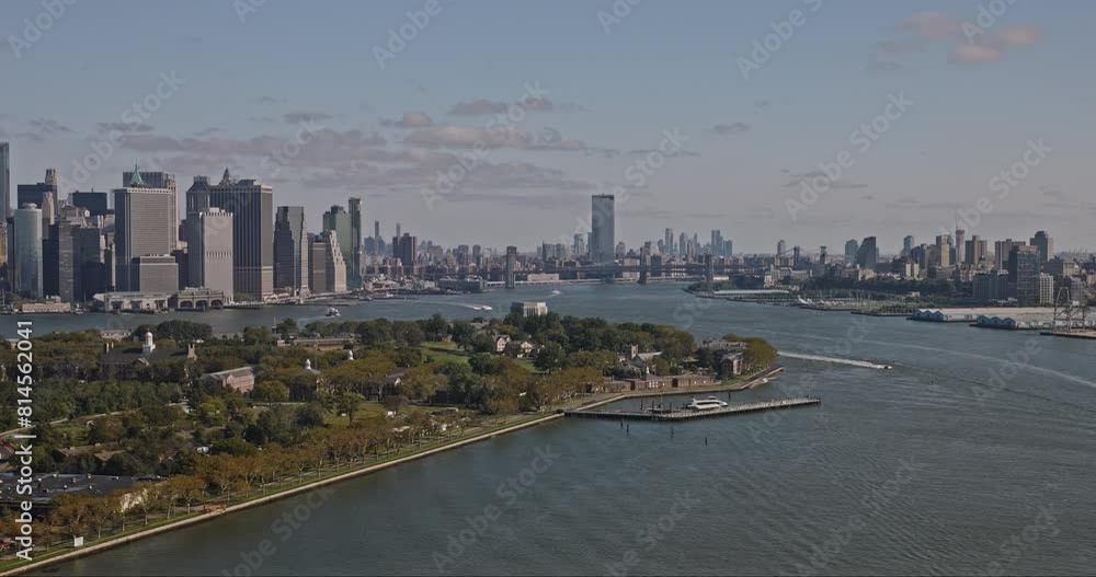 NYC New York Aerial v188 low flyover Buttermilk Channel capturing Governors Island, cityscape of Brooklyn and Manhattan with helicopter flying across the sky - Shot with Inspire 3 8k - September 2023 NYC New York Aerial v188 low flyover Buttermilk Channel capturing Governors Island, cityscape of Brooklyn and Manhattan with helicopter flying across the sky - Shot with Inspire 3 8k - September 2023