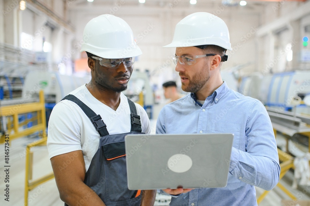 Two Heavy Industry Engineers Stand in Factory Two Heavy Industry Engineers Stand in Factory
