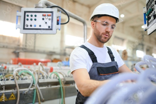 Factory worker. Man working on the production line