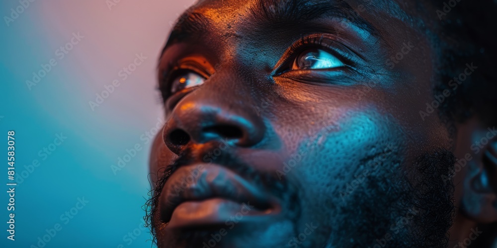 Vibrant close-up portrait of thoughtful african man. Vibrant close-up portrait of thoughtful african man.