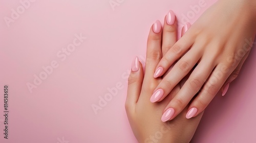 Girl s hands with a beautiful light pink manicure on a pink background  beauty concept. Generative AI
