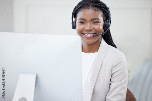 Computer, advisor or black woman in telemarketing call center consulting or communication for loan advice. Finance business, customer support or virtual assistant talking or typing online in office