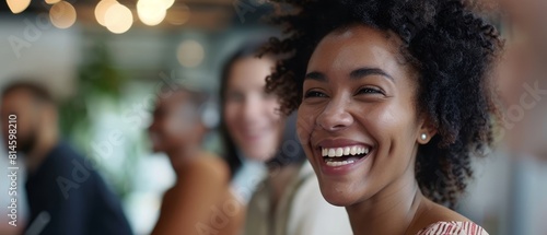 Image of a diverse team of call center employees laughing and smiling during a training session  promoting a positive work culture
