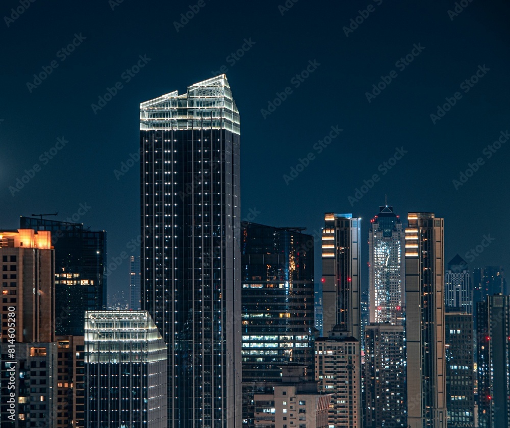 Obraz premium Stunning aerial view of the bustling metropolitan cityscape of Wuhan, China at night.