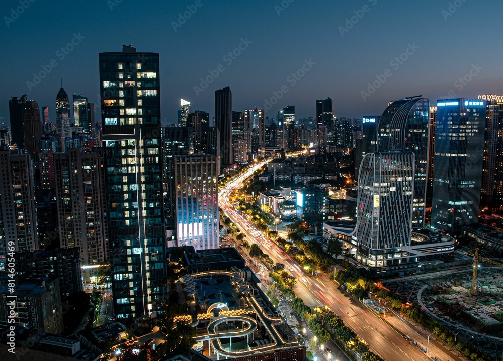 Stunning aerial view of the bustling metropolitan cityscape of Wuhan, China at night. Stunning aerial view of the bustling metropolitan cityscape of Wuhan, China at night.