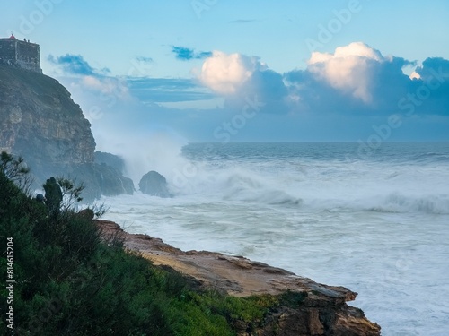 some kind of ocean that is in the air over a body of water photo