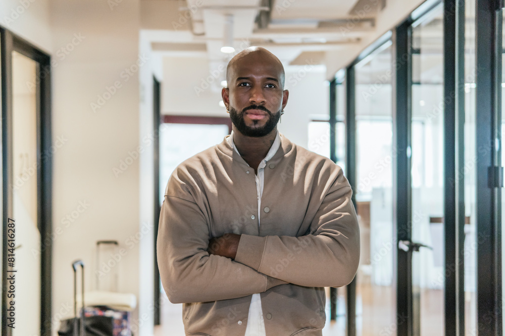 Confident entrepreneur in modern coworking space Confident entrepreneur in modern coworking space