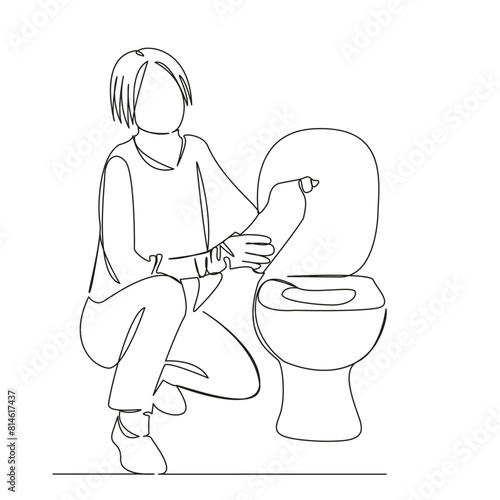 woman cleaning the toilet