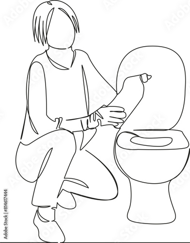 woman cleaning the toilet