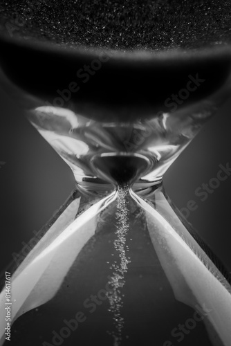 Hourglass on black background © banusevim
