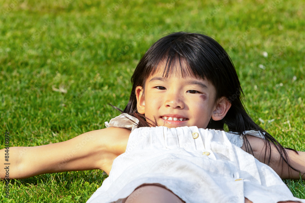 Asian Girl Enjoying a Sunny Day Outdoors in Europe Asian Girl Enjoying a Sunny Day Outdoors in Europe