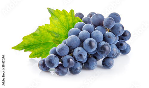 Blue grapes with green leaf healthy eating, isolated on white background. © Yasonya