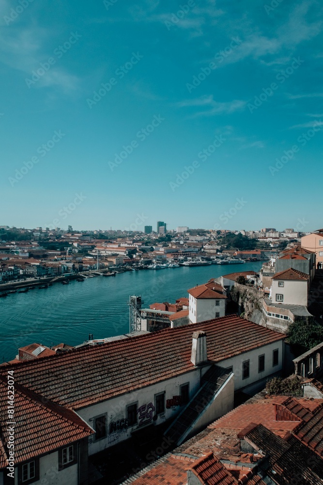 Vertical aerial view of historic buildings near the water in Porto, Portugal Vertical aerial view of historic buildings near the water in Porto, Portugal
