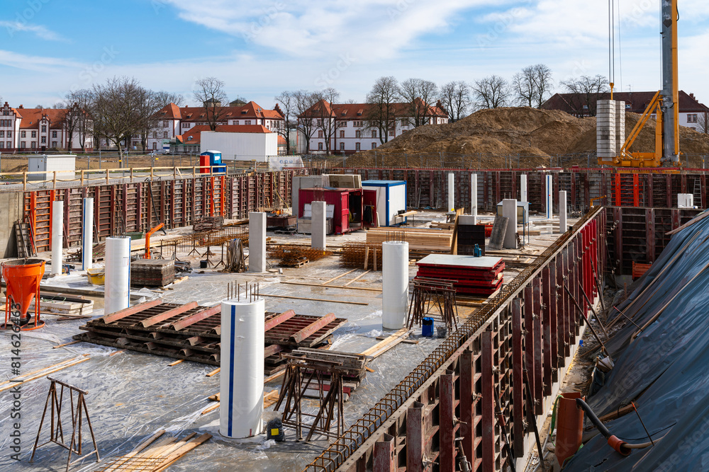 Construction site with foundation construction starting. Reinforcement and concrete. Construction site with foundation construction starting. Reinforcement and concrete.