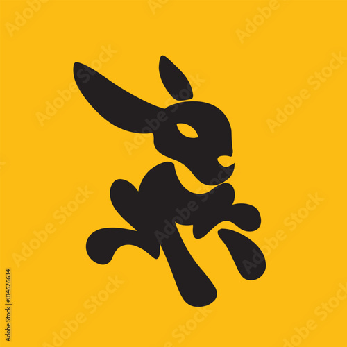 Black silhouette of a rabbit on a vibrant orange background