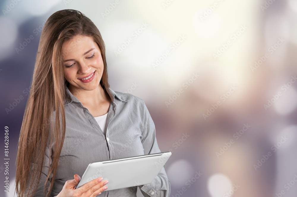 Photo of minded smart woman look at digital tablet Photo of minded smart woman look at digital tablet