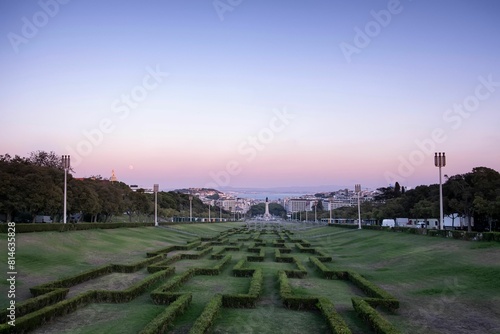 Sunset over the gardens of Eduardo VII park, with the city of Lisbon in the background, Portugal photo