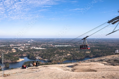 a gondola with people on it in a scenic area