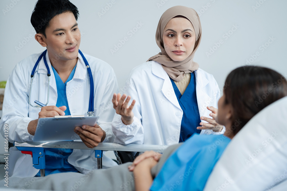 medicine, healthcare and people concept - doctor talking to male patient at bed in hospital. medicine, healthcare and people concept - doctor talking to male patient at bed in hospital.
