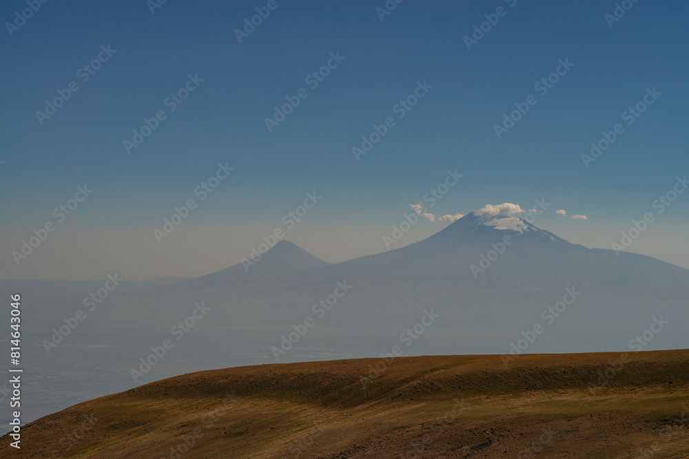 Fototapeta premium Big and little Ararat mountain during dramatic sunrise, symbol of Armenia.Beautiful mountain Ararat Armenia